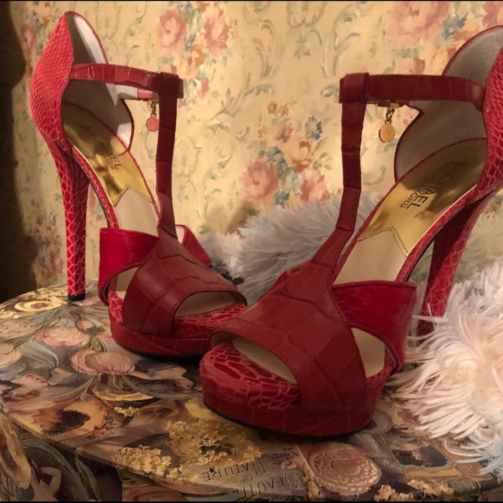 Red Michael Kors 100% Calf fur. Never been worn.